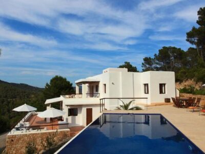 View of villa and pool photo - Casa Kiva: 6 bedroom child friendly luxury villa with infinity pool in Es Cubells, Ibiza