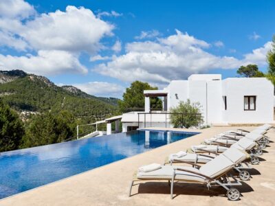 View of sunbeds and pool photo - Casa Kiva: 6 bedroom child friendly luxury villa with infinity pool in Es Cubells, Ibiza